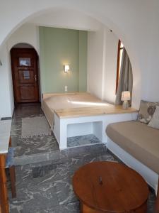 Postel nebo postele na pokoji v ubytování Dilina Guesthouse - Alkioni