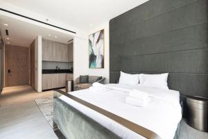 Cama o camas de una habitación en Studio with Balcony and Coworking Space in The Autograph JVC