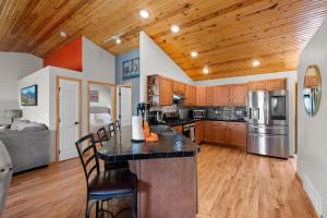 a kitchen with wooden cabinets and a counter top at 221 Potlach in Woodland Park