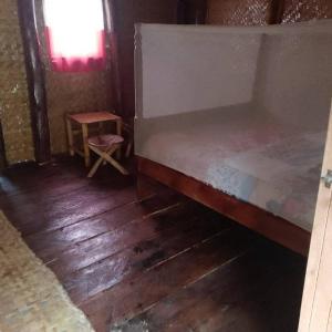Cama o camas de una habitación en Weaver Bird Hostel