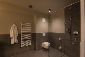 Ένα μπάνιο στο Berg & Golf Resort Westendorf by ALPS RESORTS