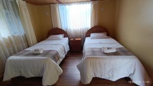 Postel nebo postele na pokoji v ubytování Ecolodge Don Felix