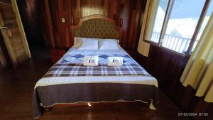 Postel nebo postele na pokoji v ubytování Ecolodge Don Felix