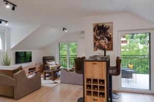 a living room with a couch and chairs at Vila Dara in Vrnjačka Banja