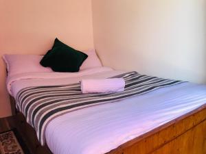 Postelja oz. postelje v sobi nastanitve Mita Hotel-Resort Marga