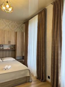 Cama o camas de una habitación en Shine Hill შაინ ჰილი