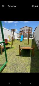 a group of benches sitting in a park at Condominio Reserva do Delta 1 in Parnaíba