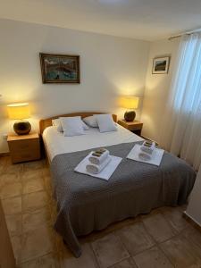 Posteľ alebo postele v izbe v ubytovaní Pucisca Vero Apartments