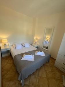 Posteľ alebo postele v izbe v ubytovaní Pucisca Vero Apartments