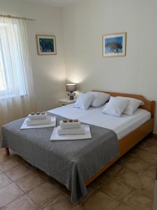 Posteľ alebo postele v izbe v ubytovaní Pucisca Vero Apartments