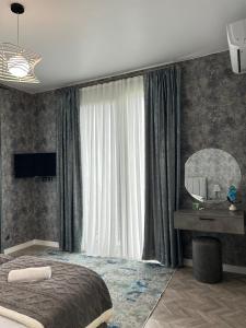 Cama o camas de una habitación en Shine Hill შაინ ჰილი