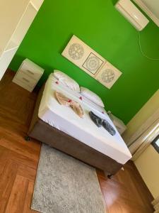 Postel nebo postele na pokoji v ubytování Eugénia e Filhas Holiday house