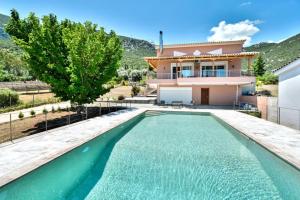 Πισίνα στο ή κοντά στο AURA Beach House