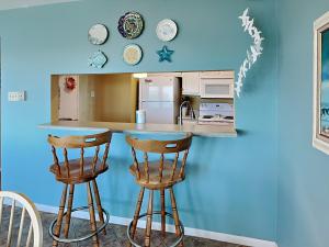 Kuchyň nebo kuchyňský kout v ubytování Watercolor Skies