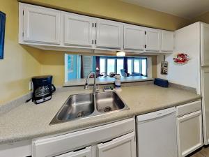 Kuchyň nebo kuchyňský kout v ubytování Watercolor Skies