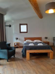 Un pat sau paturi într-o cameră la Bapsha Guesthouse