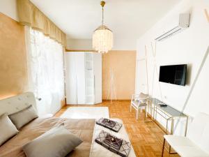 TV a/nebo společenská místnost v ubytování B&B LE CHEVALIER