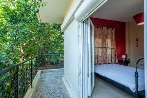 Ένα ή περισσότερα κρεβάτια σε δωμάτιο στο dolphin apartment