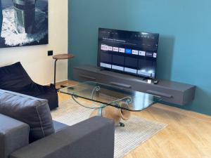 TV a/nebo společenská místnost v ubytování Hotel Tuyo