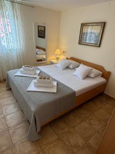 Posteľ alebo postele v izbe v ubytovaní Pucisca Vero Apartments