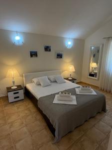 Posteľ alebo postele v izbe v ubytovaní Pucisca Vero Apartments