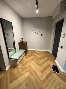Ένα ή περισσότερα κρεβάτια σε δωμάτιο στο Nova Apartament