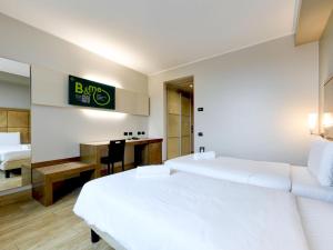 Postel nebo postele na pokoji v ubytování B&B HOTEL Padova + 18 fotografií