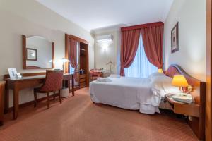 Posteľ alebo postele v izbe v ubytovaní Massimo Plaza Hotel