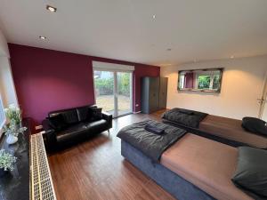 Χώρος καθιστικού στο Exklusive Ferienwohnung mit schönem Garten und Blick ins Grüne