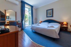 Posteľ alebo postele v izbe v ubytovaní Massimo Plaza Hotel + 37 fotografií