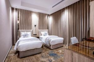 Voodi või voodid majutusasutuse نوران استار للشقق المخدومة toas