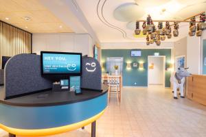 TV/Unterhaltungsangebot in der Unterkunft Hey Lou Hotel Piding