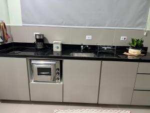 Dapur atau dapur kecil di Aluguel de casa - estilo loft - PARA TEMPORADA