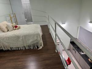 Katil atau katil-katil dalam bilik di Aluguel de casa - estilo loft - PARA TEMPORADA