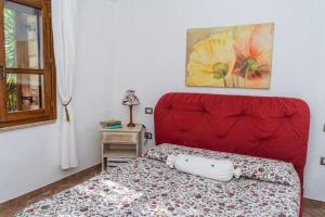 Posteľ alebo postele v izbe v ubytovaní Villetta il Carrubo vista mare
