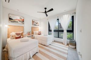 Postel nebo postele na pokoji v ubytování Allure 101 condo + 18 fotografií