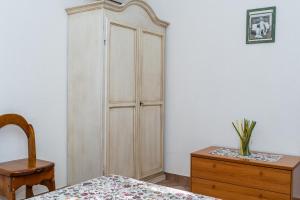 Posteľ alebo postele v izbe v ubytovaní Villetta il Carrubo vista mare
