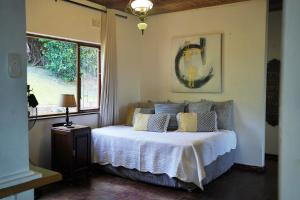 Ένα ή περισσότερα κρεβάτια σε δωμάτιο στο Breeze & Bliss Beach House 300m Walk to the Beach!