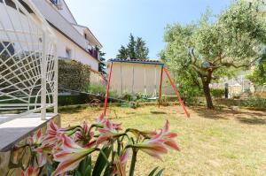 Ein Garten an der Unterkunft Apartment Milena