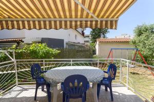 Ein Balkon oder eine Terrasse in der Unterkunft Apartment Milena