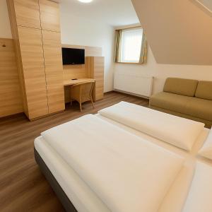 Postel nebo postele na pokoji v ubytování Landhaus Scherling