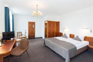 Postel nebo postele na pokoji v ubytování Trip Inn Klee am Park Wiesbaden