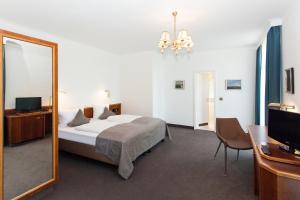 Postel nebo postele na pokoji v ubytování Trip Inn Klee am Park Wiesbaden