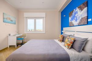 A bed or beds in a room at ARTrinacria Apartments - Qubba