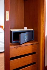 Posteľ alebo postele v izbe v ubytovaní Massimo Plaza Hotel
