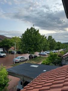 a table with solar panels on top of a parking lot at Komplett neu renovierte Wohnung! in Hannover