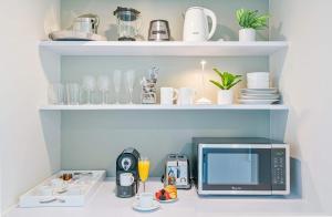 Køkken eller tekøkken på MVR Suite in Grove-s Best-Kept Secret