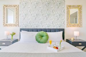 En eller flere senge i et værelse på MVR Suite in Grove-s Best-Kept Secret