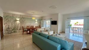 Televiisor ja/või meelelahutuskeskus majutusasutuses Casa do Algarve by Check-in Portugal