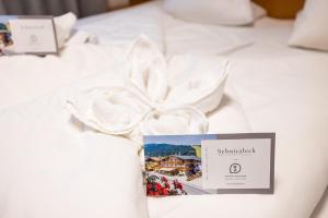 A bed or beds in a room at Schnitzl-Eck